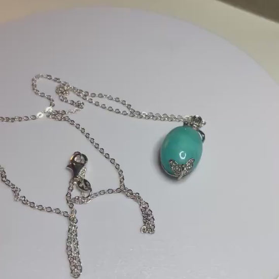 Peruvian Amazonite pendant or necklace in solid sterling silver with butterfly and floral ribbon motif